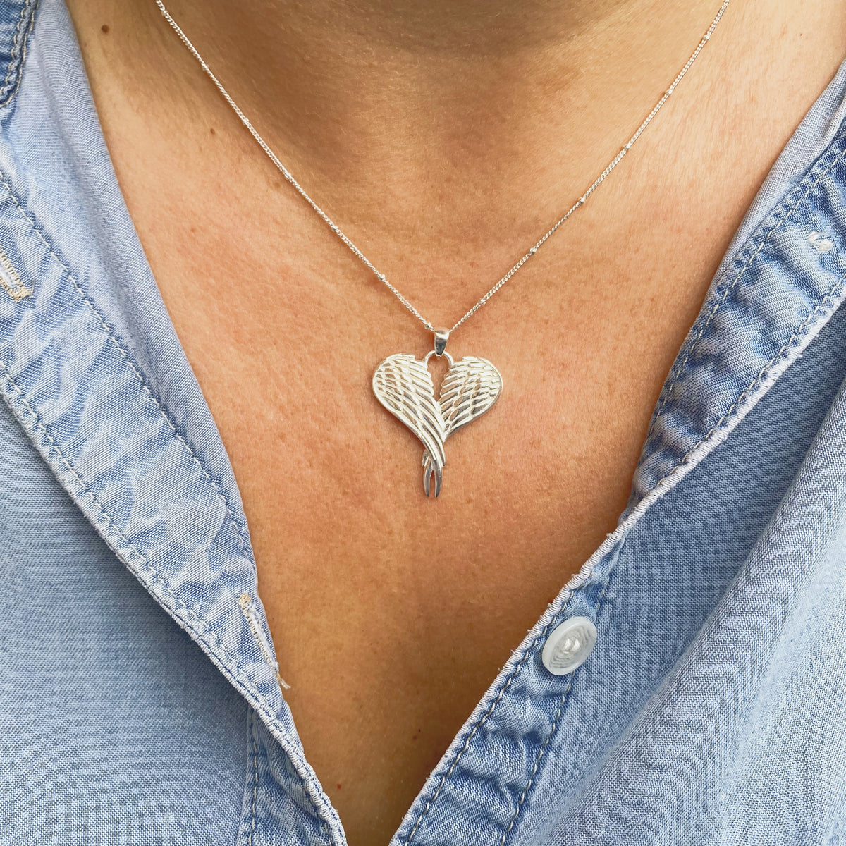 Sterling silver hot sale wing necklace