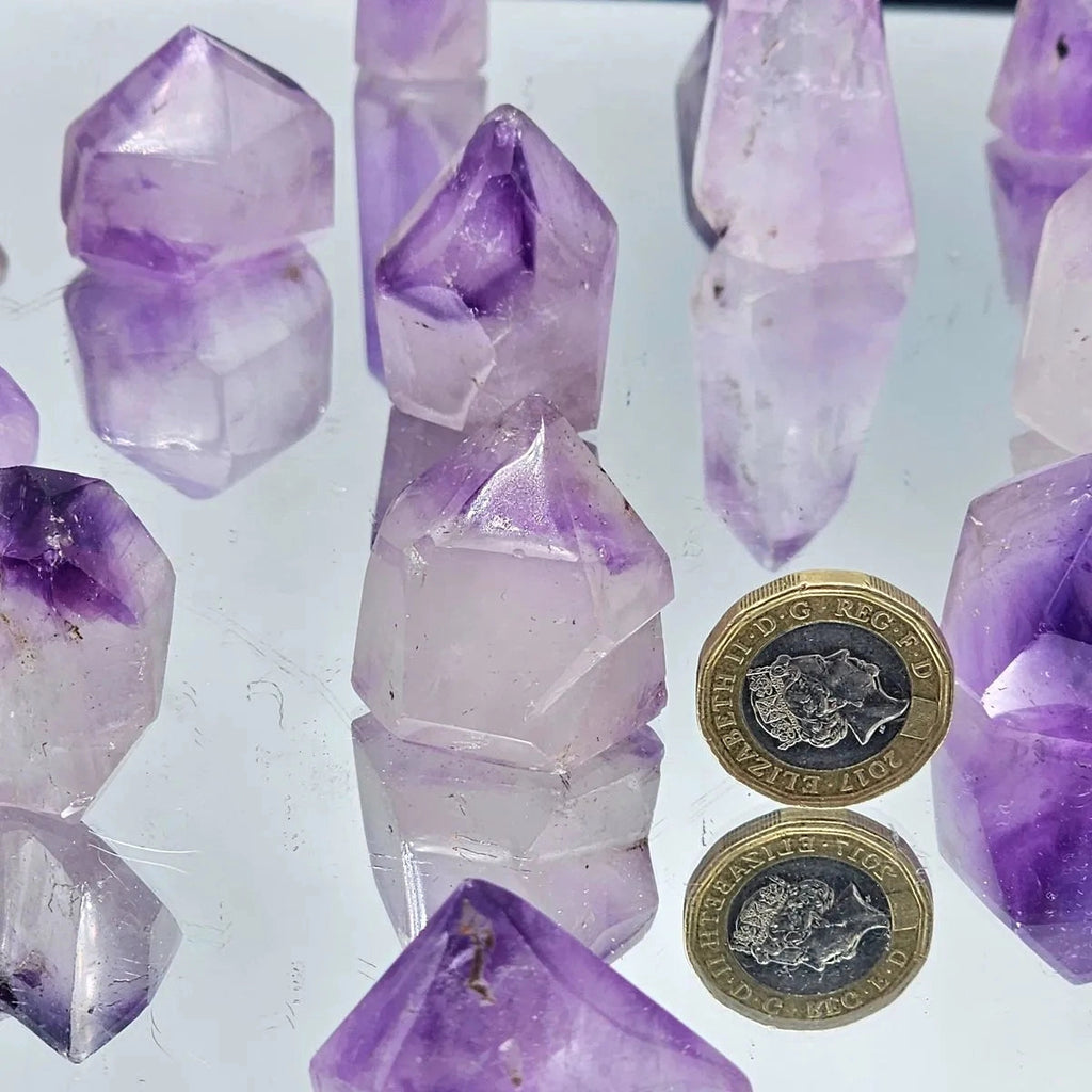 Earth and Elements Jewellery

https://www.earthandelements.co.uk › products › small-phantom-amethyst-quartz-crystal-prisms-towers-20-30g