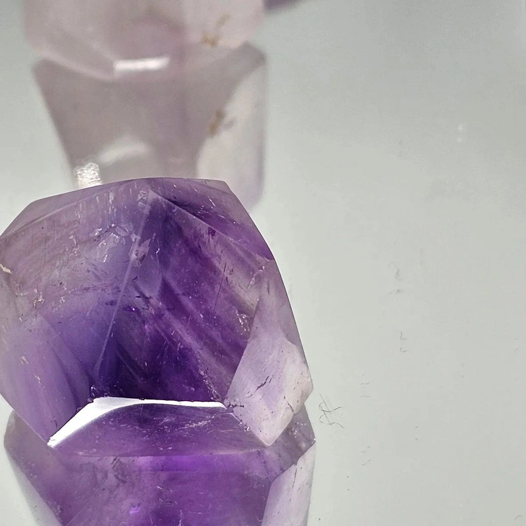 Earth and Elements Jewellery

https://www.earthandelements.co.uk › products › small-phantom-amethyst-quartz-crystal-prisms-towers-20-30g