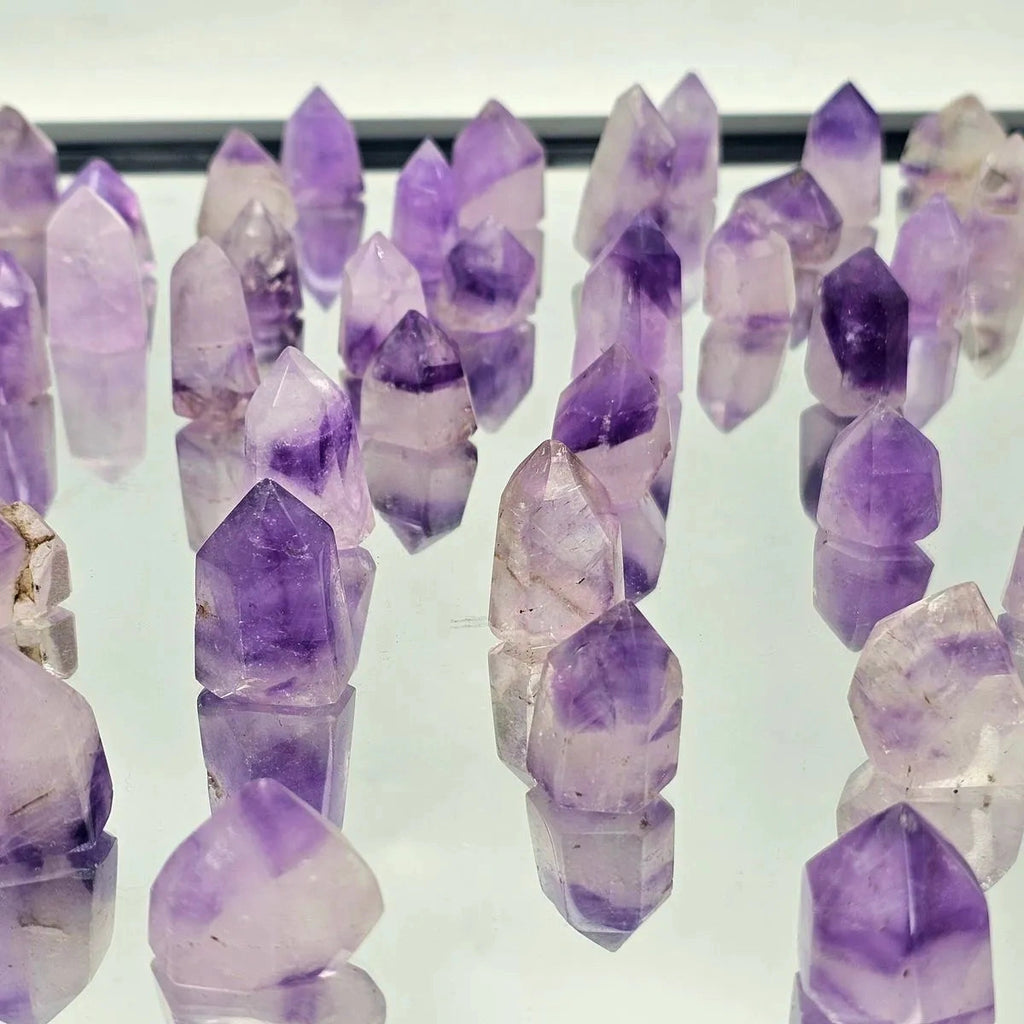 Earth and Elements Jewellery

https://www.earthandelements.co.uk › products › small-phantom-amethyst-quartz-crystal-prisms-towers-20-30g