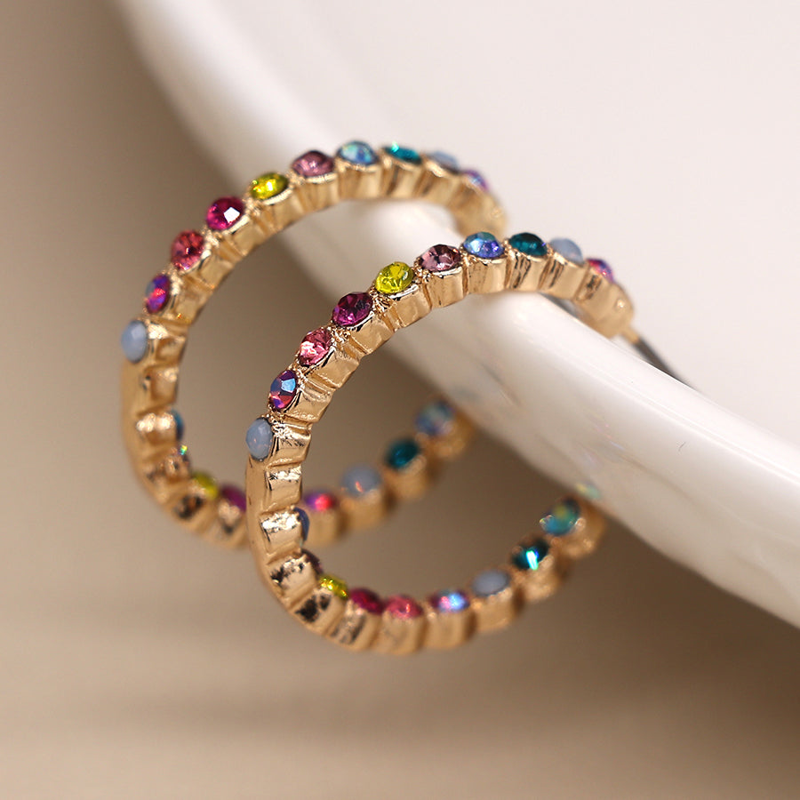 Earth and Elements Jewellery

https://www.earthandelements.co.uk › products › golden-multicoloured-crystal-inset-hoop-earrings