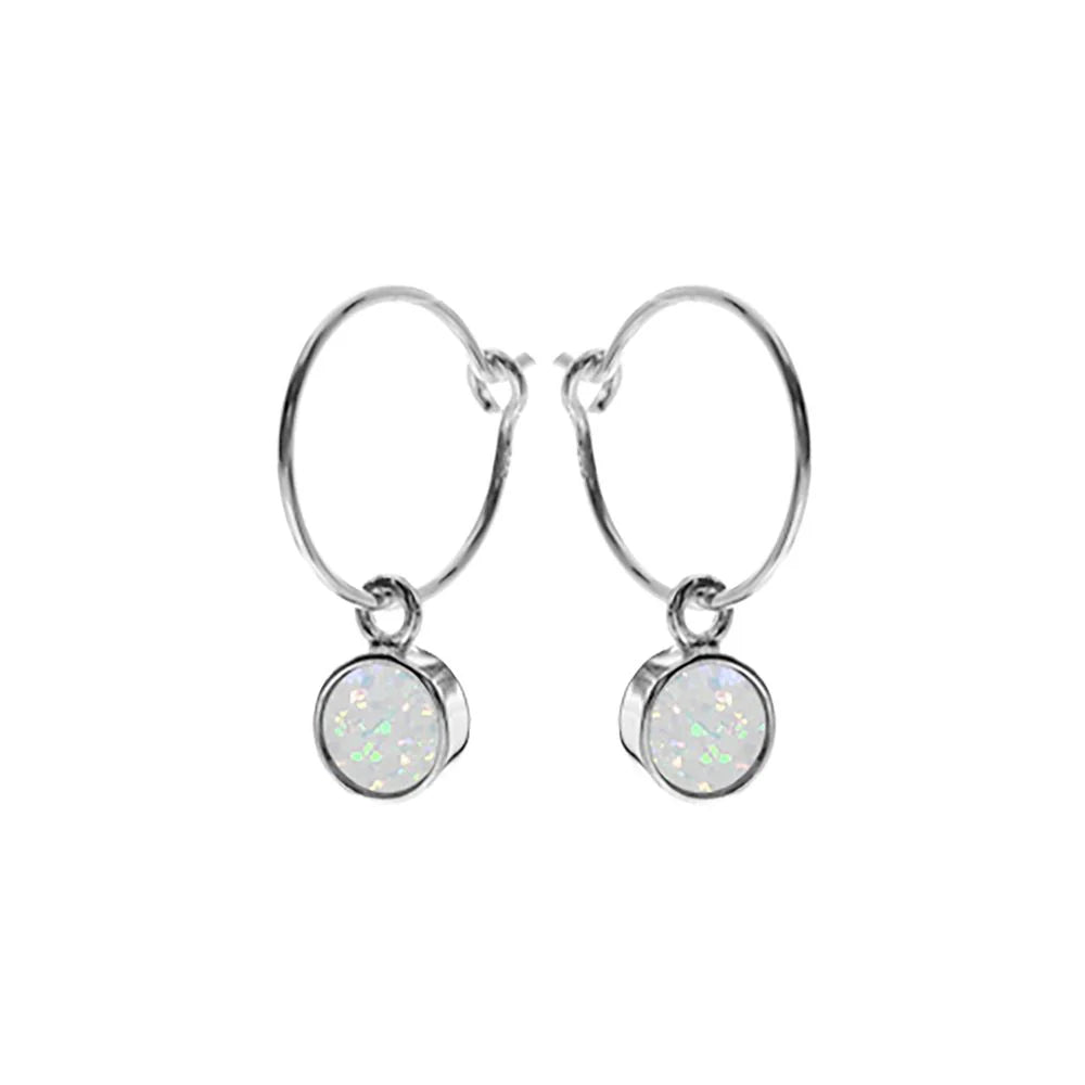 Earth and Elements Jewellery

https://www.earthandelements.co.uk › products › mini-blue-opal-silver-hoop-earrings-new