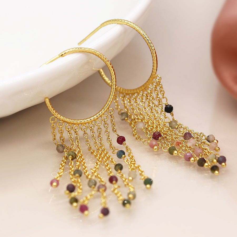 Earth and Elements Jewellery

https://www.earthandelements.co.uk › products › gold-plated-hoop-multichain-and-tourmaline-earrings