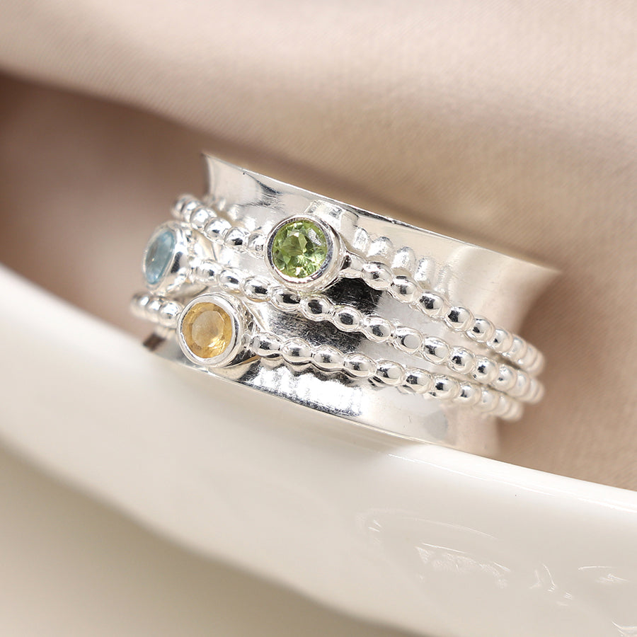 Earth and Elements Jewellery

https://www.earthandelements.co.uk › products › sterling-silver-mixed-gemstone-peridot-topaz-and-citrine-spinning-ring