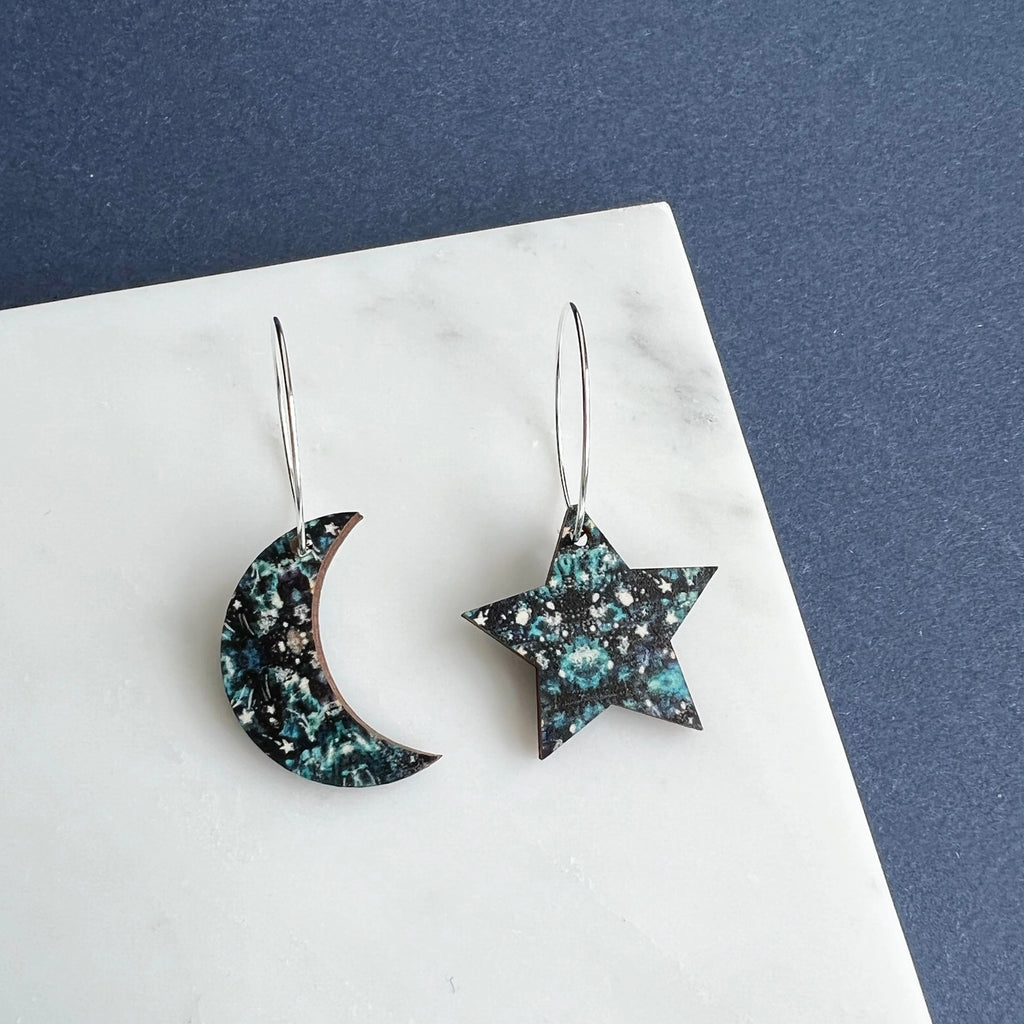 Earth and Elements Jewellery

https://www.earthandelements.co.uk › products › moon-star-hoop-earrings-gold-silver-rose-gold-hoop