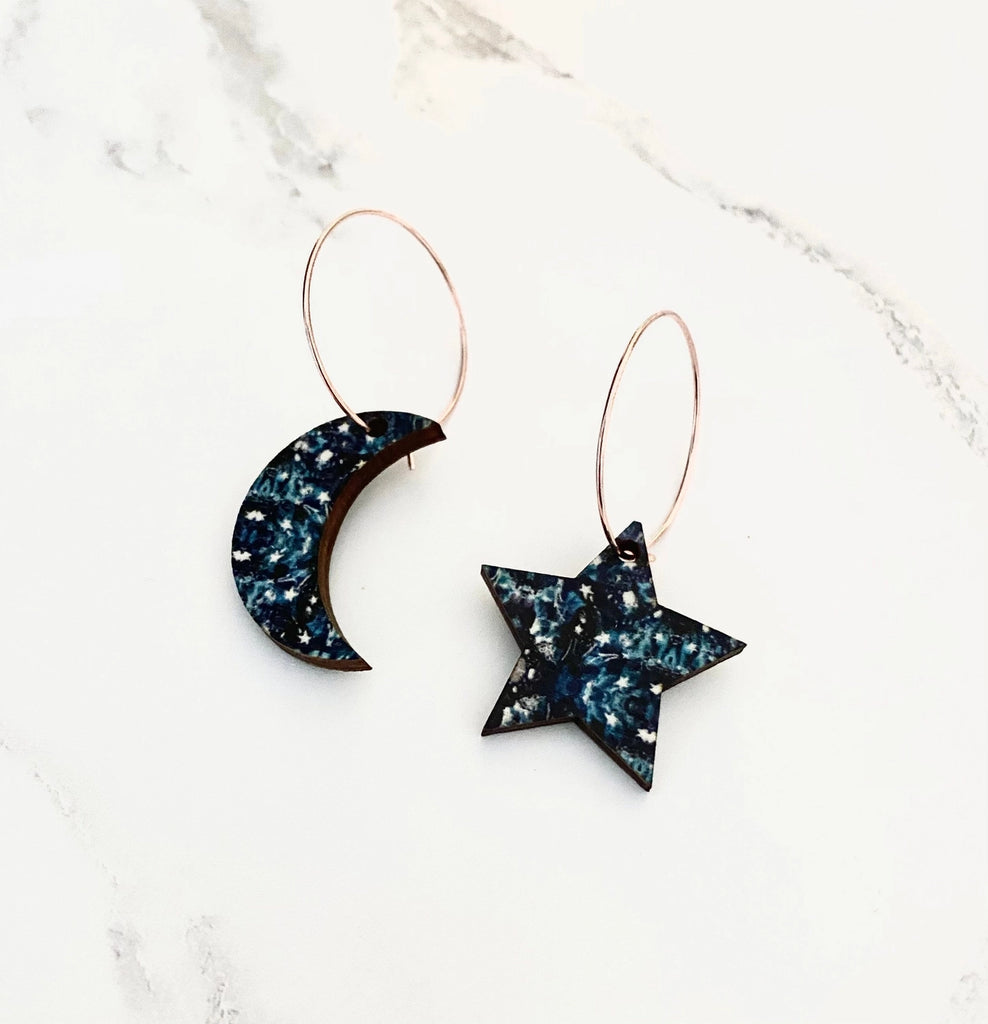 Earth and Elements Jewellery

https://www.earthandelements.co.uk › products › moon-star-hoop-earrings-gold-silver-rose-gold-hoop